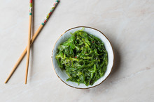 Japanese Wakame Seaweed Salad With Chopsticks.