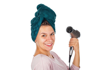 Wall Mural - Smiling woman blow drying her hair