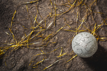 Wall Mural - Christmas toy ball with a tinsel of new year shawls