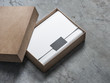 Kraft Brown Box package Mockup with wrapping paper and black card, 3d rendering