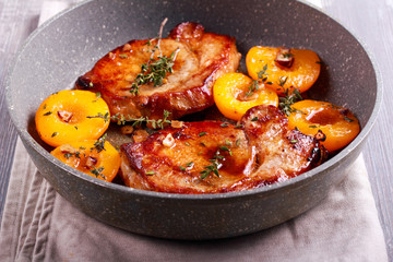 Thyme peachy pork chops