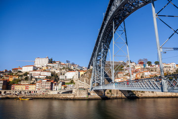 Wall Mural - Beautiful cityscape, Porto, Portugal, old city. View of the famous Luis bridge first. A popular destination for traveling in Europe