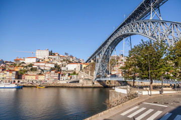 Wall Mural - Beautiful cityscape, Porto, Portugal, old city. View of the famous Luis bridge first. A popular destination for traveling in Europe