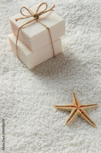 Fotografie, Obraz Two gift soap bar on white towel with space for text