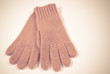 © morissfoto - Winter, woolen gloves on a white background.