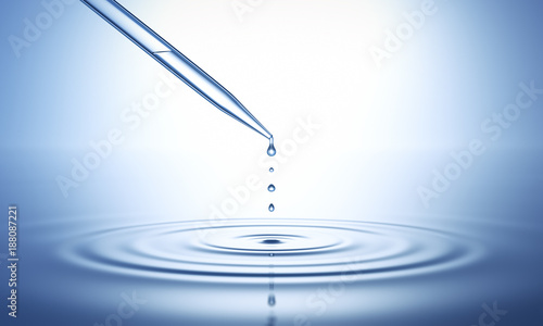 Fotomural Pipette mit Tropfen auf Wasserfläche