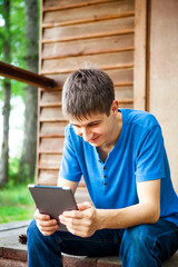 Canvas Print - Young Man with a Tablet