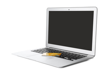 Poster - Laptop with credit card, isolated on white. Internet shopping concept