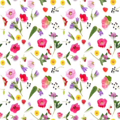 Wall Mural - Seamless pattern from plants, wild flowers and  berries, isolated on white background, flat lay, top view. The concept of summer, spring, Mother's Day, March 8. 