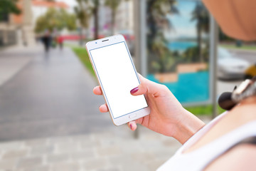 Poster - Woman use mobile phone on city streets. Isolated screen for mockup, app or responsive web site presentation.