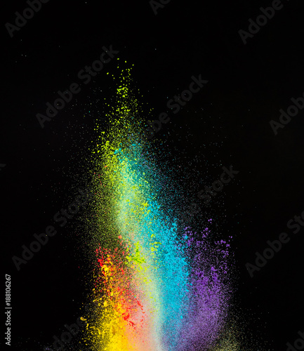 Launched colorful powder, isolated on black background