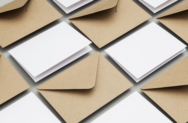 blank white card with kraft brown paper envelope template mock up
