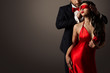 Couple Love Kiss, Sexy Blindfolded Woman Dancing in Red Dress and Elegant Man in Suit