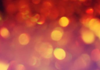 Wall Mural - Bright warm toned red orange bokeh beautiful festive texture background