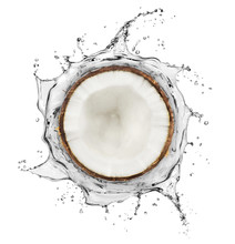 Coconut Is Surrounded By A Splash Of Water On White Background
