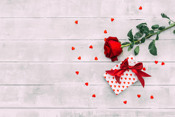 Canvas Print - Red rose and box with red hearts. Valentines Day concept.