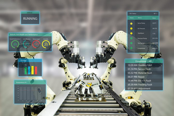 iot industry 4.0 concept.Smart factory using automation robotic arms with augmented mixed virtual reality technology to show data with artificial intelligence user interface (ui) while operation line