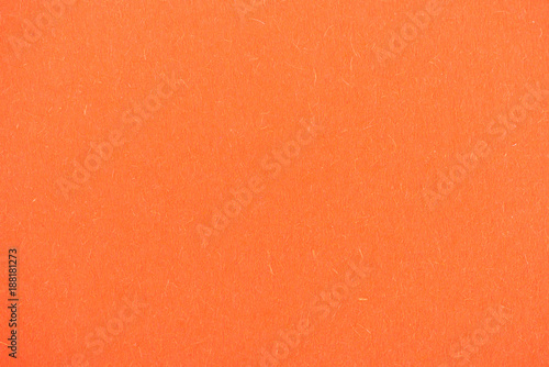 Plakaty pomarańczowe  tekstura-jasnego-pomaranczowego-papieru-jako-tlo