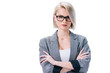 © LIGHTFIELD STUDIOS - attractive businesswoman in eyeglasses with crossed arms, isolated on white