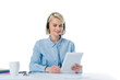 © LIGHTFIELD STUDIOS - portrait of young call center operator in headset using tablet at workplace isolated on white