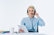 © LIGHTFIELD STUDIOS - portrait of young call center operator in headset with tablet at workplace