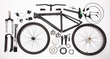 Top View Still Life Of Bicycle Parts, And Equipment On The White