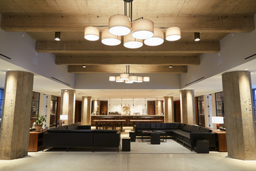 Empty bar lounge area in modern business premises, wide shot