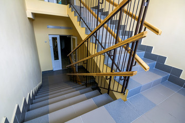 Poster - Staircase in residential building. Interior with stairs railing