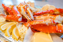 Red King Crab Legs With Fresh Lemon Slices