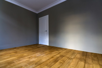 Sticker - New renovated room interior with freshly painted walls, white door and wooden parquet floor