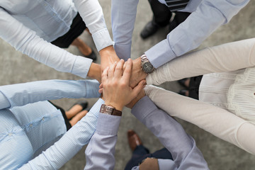 Wall Mural - Stack of hands. Unity and teamwork concept.