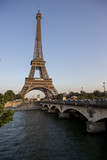 Fototapeta Boho - Eiffel Tower at sunset in Paris, France. Romantic travel background.