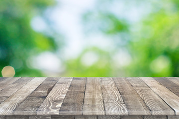 Wall Mural - empty wooden table perspective for product placement or montage with focus to table. wooden board su