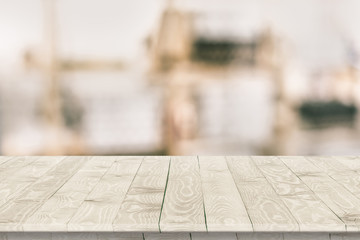 Wall Mural - empty wooden table perspective for product placement or montage with focus to table. wooden board su