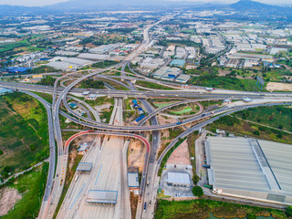 Canvas Print - aerial view of express way intersection on industrial estate area for logistics and transportation services from source to destination, Laem Chabang port, Thailand