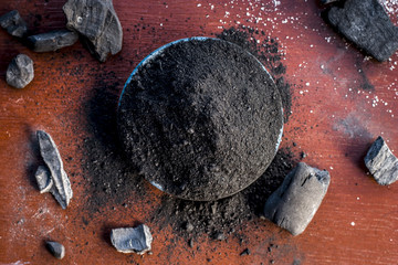 Close up of coal powder for toothache and toothpaste of traditional Asia.