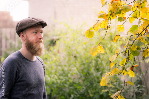 beard and flat cap
