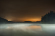 © Cavan Images - Long exposure of fog over lake at Mt Hood National Forest against sky during sunset
