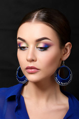 Wall Mural - Portrait of beautiful woman with fashion makeup