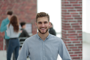 Canvas Print - Portrait of confident businessman in office.