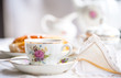 Luxury porcelain tea set with a cup, teapot, sugar bowl