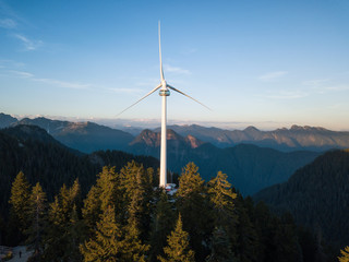 Aerial view of the wind turbine on top of a mountain. Taken in Vancouver, British Columbia, Canada.