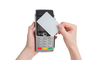 payment with NFC tecnology credit card on pos terminal in woman hands isolated on a white background