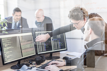 Wall Mural - startup business and entrepreneurship problem solving. young ai programmers and it software develope