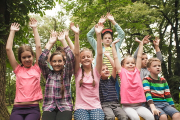 group of children on a park bench