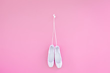 Ballet Pointe Shoes On Pink Background Top View Copy Space