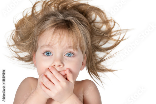 Little Beautiful Girl With Blue Eyes And Tousled Hair Covered Her