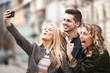 © grki - Friends enjoying city