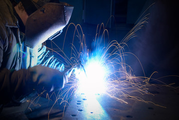 Wall Mural - Welder working at the factory