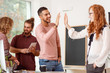 © Photographee.eu - Co-workers giving a high five